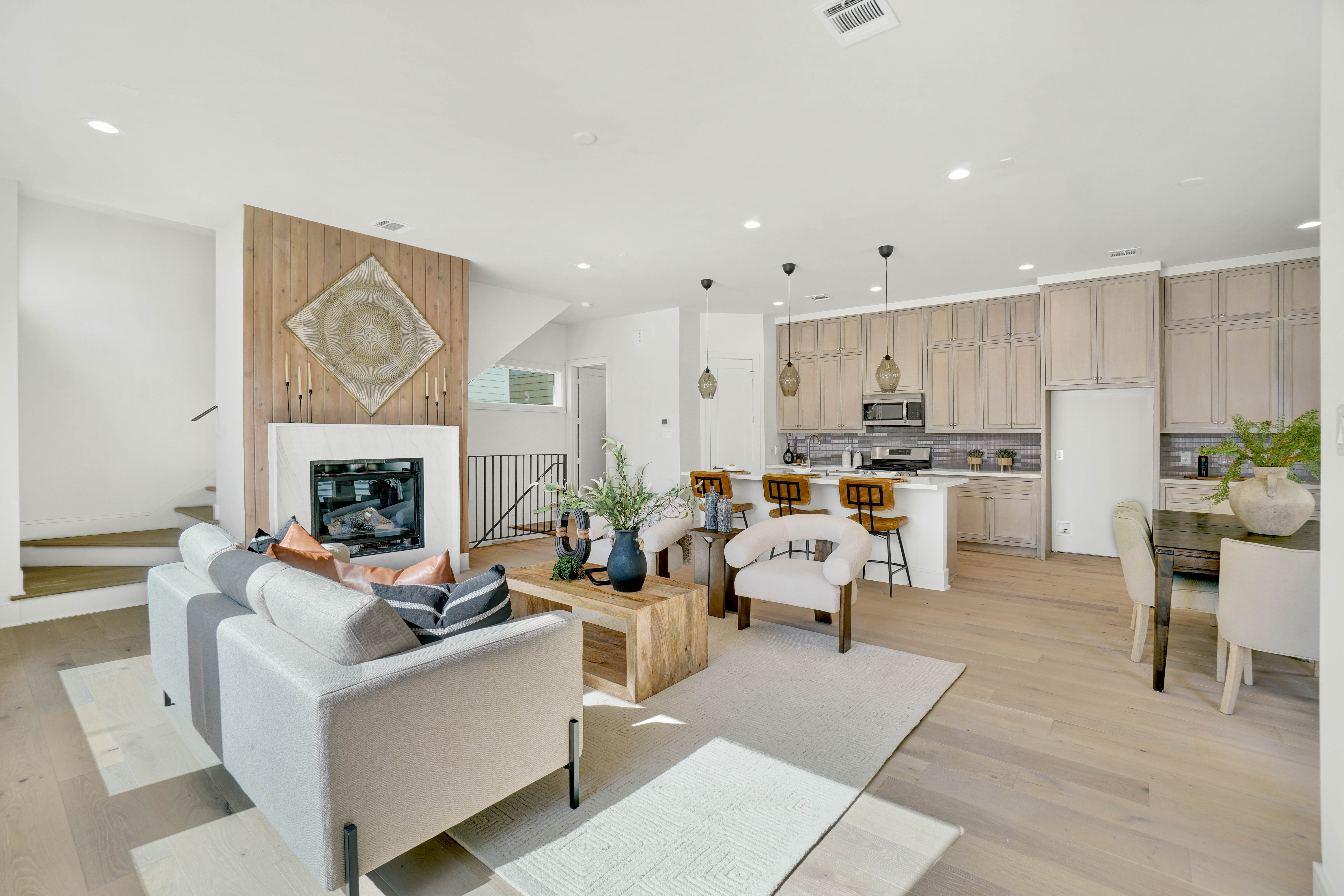 Row of modern townhomes at sunset